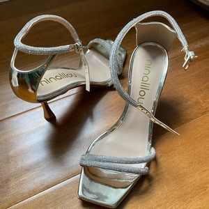 Ninalilou rhinestone strap heals. Never worn brand new. Made in San Marino
